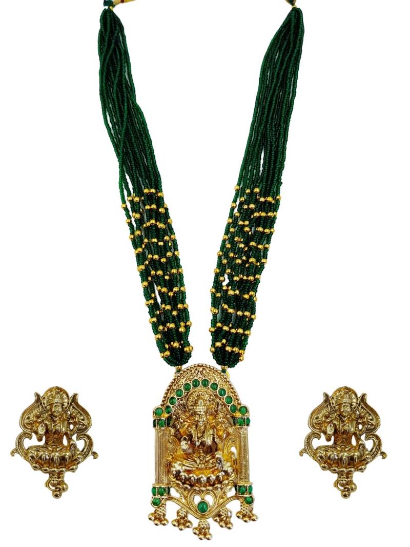 Women gold-plated & green multi-strand lakshmi temple jewellery set