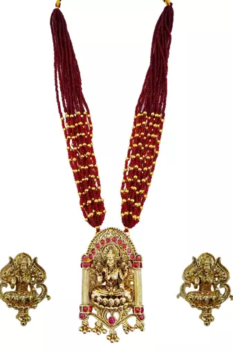 Women gold-plated & green multi-strand lakshmi temple jewellery set