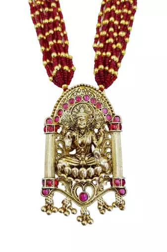 Women gold-plated & green multi-strand lakshmi temple jewellery set