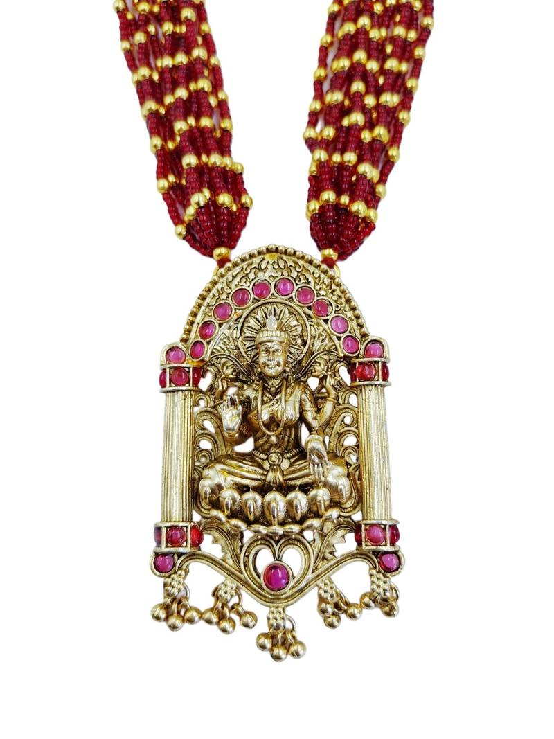 Women gold-plated & green multi-strand lakshmi temple jewellery set