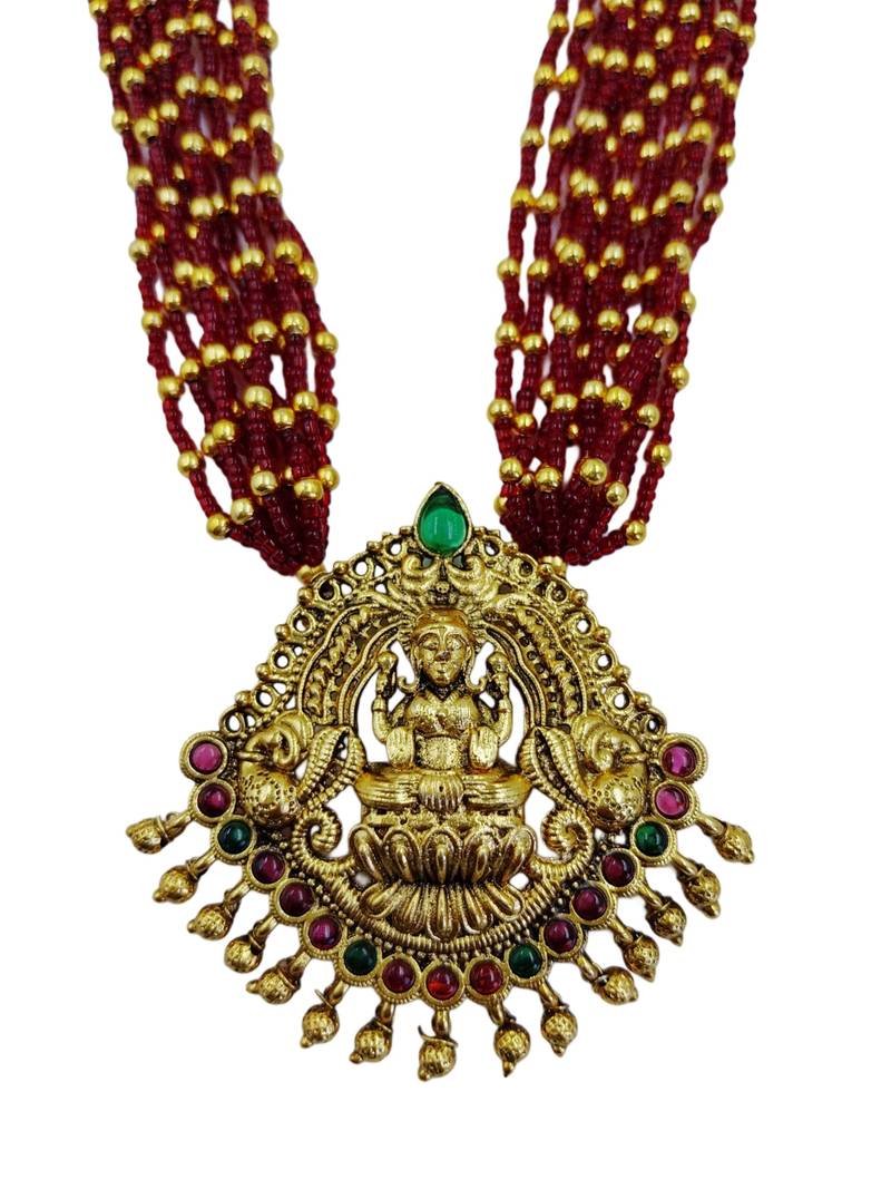 Women gold-plated & ruby multi-strand lakshmi temple jewellery set