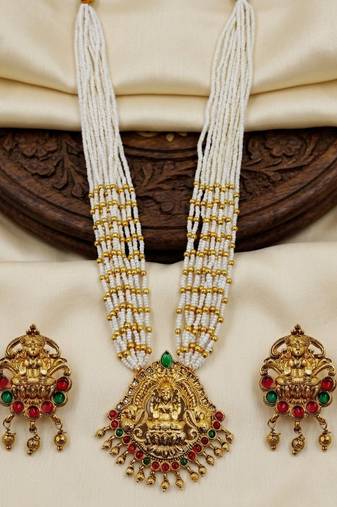 Women gold-plated & white multi-strand lakshmi temple jewellery set
