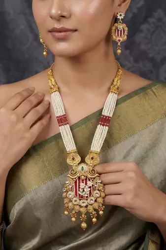 Women gold-plated white pearl & red kundan studded traditional long jewellery set
