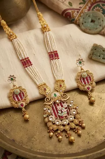 Women gold-plated white pearl & red kundan studded traditional long jewellery set