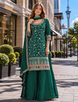 Dark green vichitra suit with heavy embroidery work 1