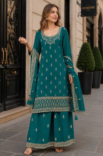 Teal green georgette semi stitched suit with heavy embroidery work