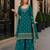 Teal green georgette semi stitched suit with heavy embroidery work