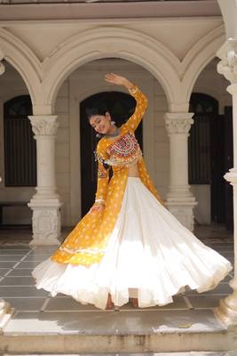 yellow embroidered long kurti with cotton lehenga 3