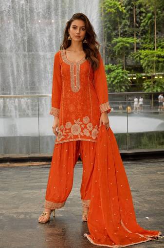 Orange chinon free size stitched suit with embroidery & beats work