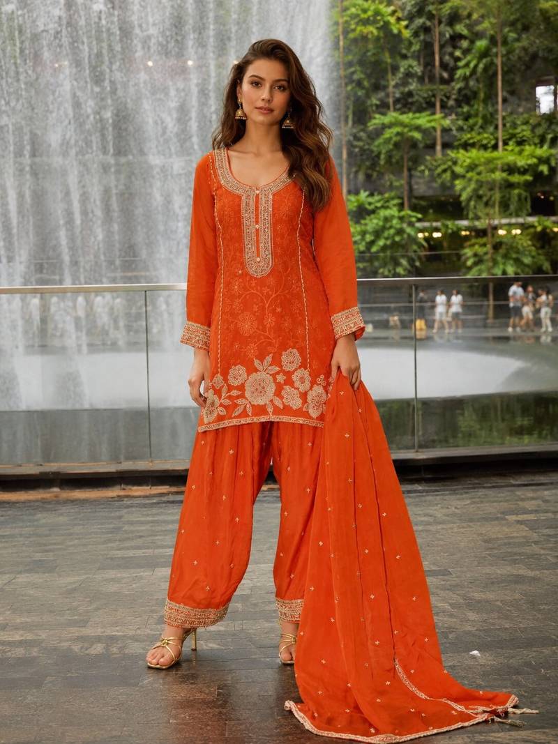 Orange chinon free size stitched suit with embroidery & beats work