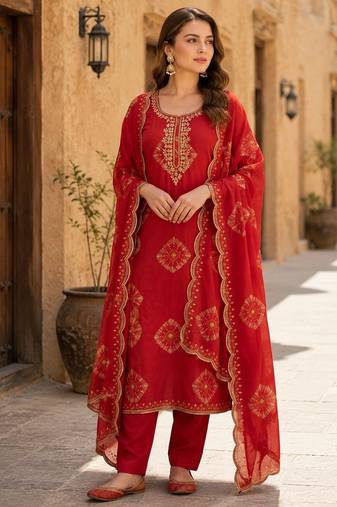 Orange silk unstitched suit with printed & khatli work