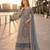 Grey net semi stitched suit with coding and embroidery work