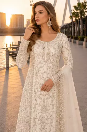 White net semi stitched suit with coding and embroidery work