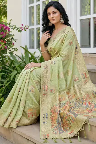 Green colour linen cotton saree with jacquard weaving & tassel pallu