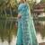 Seagreen colour linen saree with floral jacquard weaving & tassel pallu
