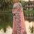 Peach colour linen saree with floral jacquard weaving & tassel pallu