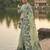 Lightgreen colour linen saree with floral jacquard weaving & tassel pallu