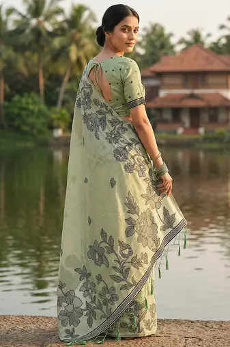 Lightgreen colour linen saree with floral jacquard weaving & tassel pallu