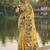 Yellow colour linen saree with floral jacquard weaving & tassel pallu