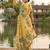 Yellow colour linen saree with floral jacquard weaving & tassel pallu