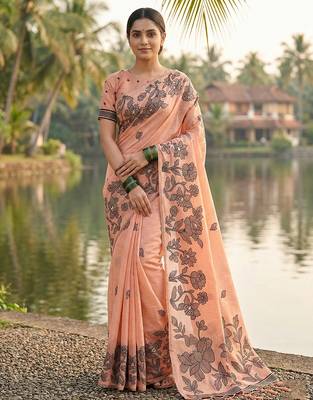 Orange coour linen saree with floral jacquard weaving & tassel pallu 1