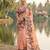 Orange coour linen saree with floral jacquard weaving & tassel pallu
