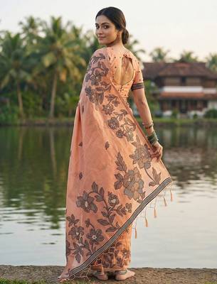 Orange coour linen saree with floral jacquard weaving & tassel pallu 2