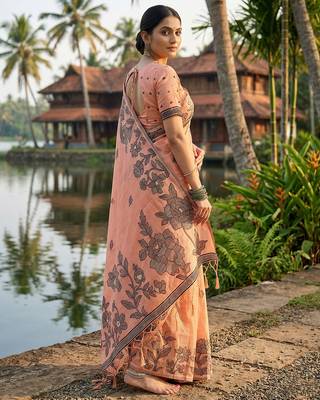 Orange coour linen saree with floral jacquard weaving & tassel pallu 3