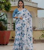 Sky blue colour ready to wear floral chinon saree with mirror border