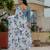 Sky blue colour ready to wear floral chinon saree with mirror border