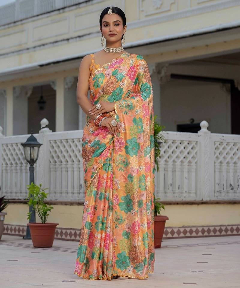 Orange colour ready to wear floral chinon saree with mirror border