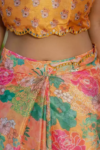 Orange colour ready to wear floral chinon saree with mirror border