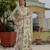 Ivory colour ready to wear floral chinon saree with mirror border