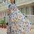 Sky blue colour ready to wear floral chinon saree with mirror border