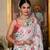 White colour ready to wear floral chinon saree with mirror border