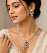 Onyx bead double strand necklace set with kundan peacock pendant and earrings, gold-toned