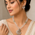 Onyx bead double strand necklace set with kundan peacock pendant and earrings, gold-toned