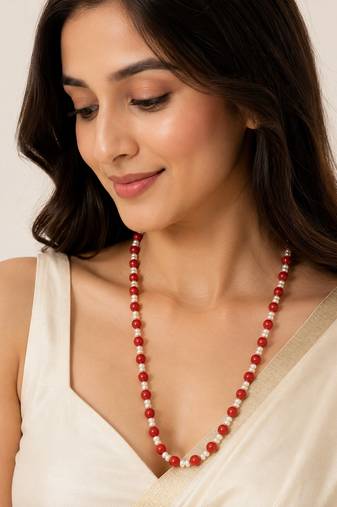 Red coral beaded necklace with freshwater pearls, gold-tone clasp, long strand