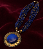 Blue & gold multi-strand beaded necklace with round medallion pendant, boho tribal style