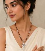 Brown and white pearl beaded necklace with silver geometric pendant, rhinestone accents, magnetic clasp