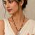 Brown and white pearl beaded necklace with silver geometric pendant, rhinestone accents, magnetic clasp