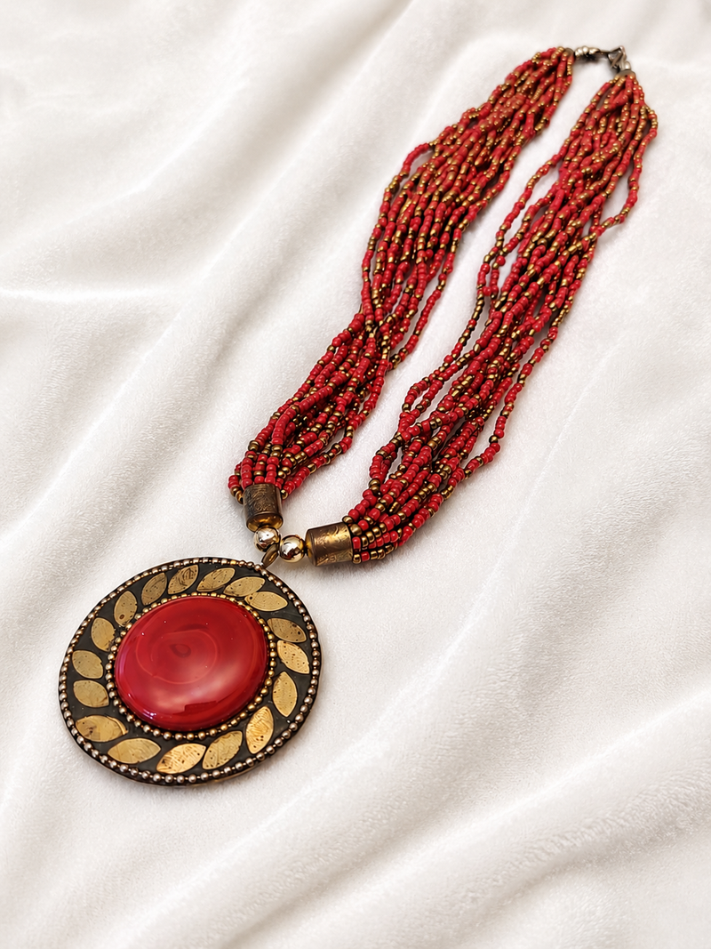 Red & gold multi-strand beaded necklace with round tribal pendant, boho ethnic style