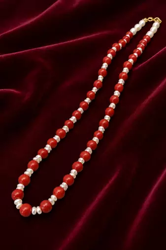 Red coral beaded necklace with freshwater pearls, gold-tone clasp, long strand