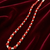 Red coral beaded necklace with freshwater pearls, gold-tone clasp, long strand