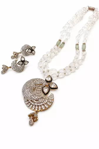 Onyx bead double strand necklace set with kundan peacock pendant and earrings, gold-toned