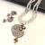 Onyx bead double strand necklace set with kundan peacock pendant and earrings, gold-toned