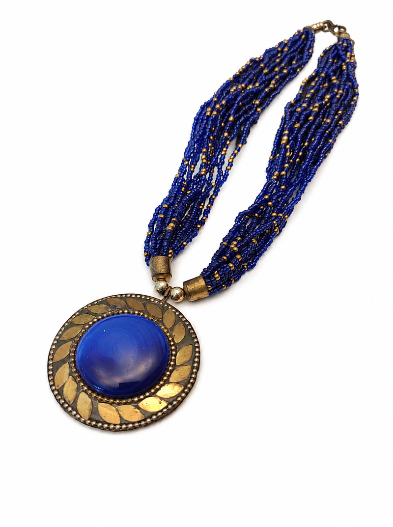 Blue & gold multi-strand beaded necklace with round medallion pendant, boho tribal style