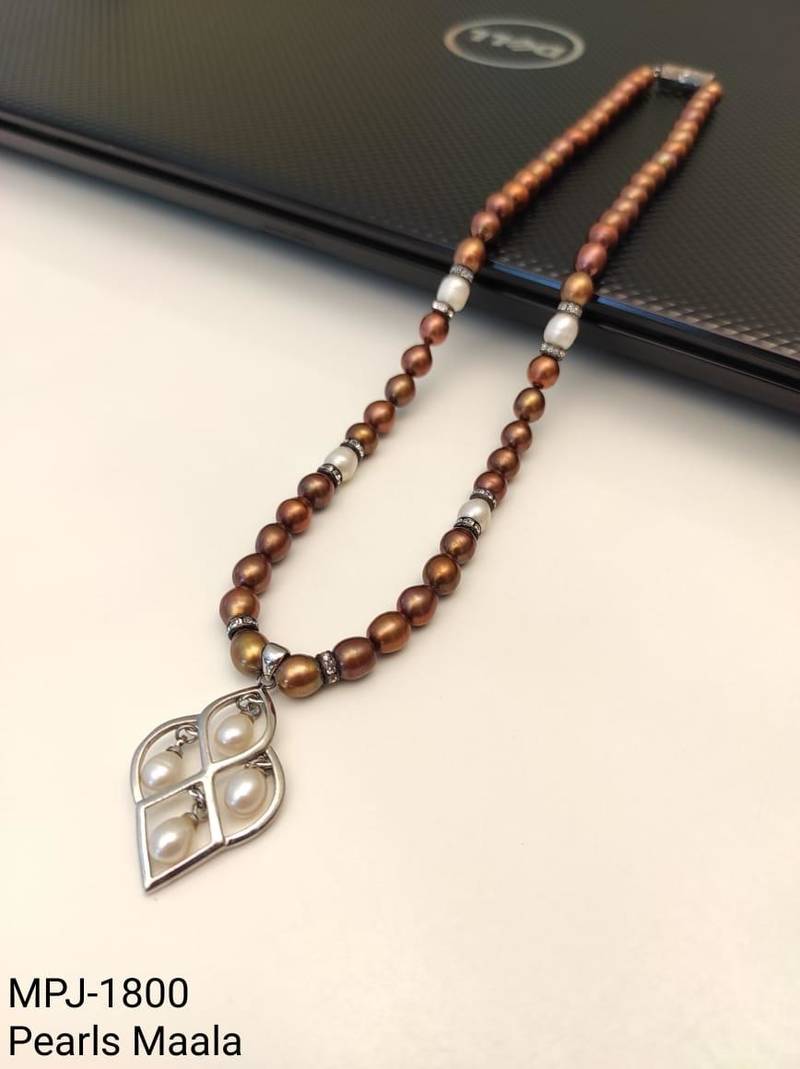 Brown and white pearl beaded necklace with silver geometric pendant, rhinestone accents, magnetic clasp