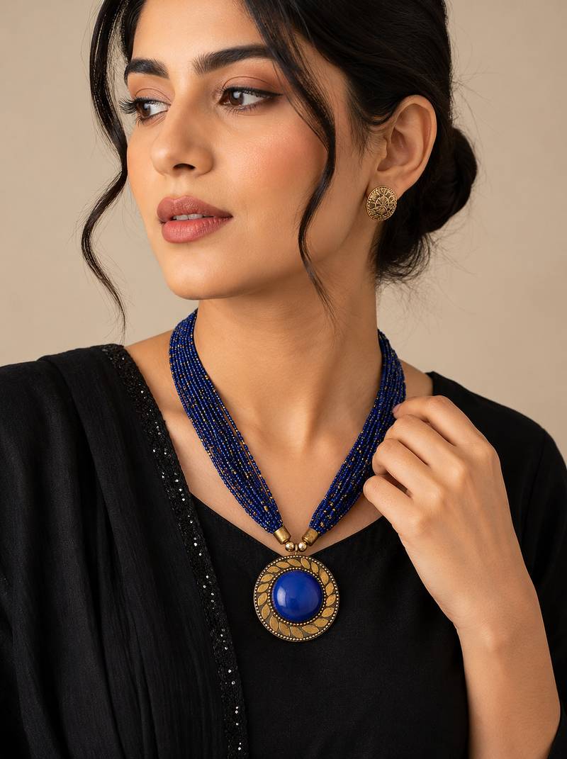Blue & gold multi-strand beaded necklace with round medallion pendant, boho tribal style