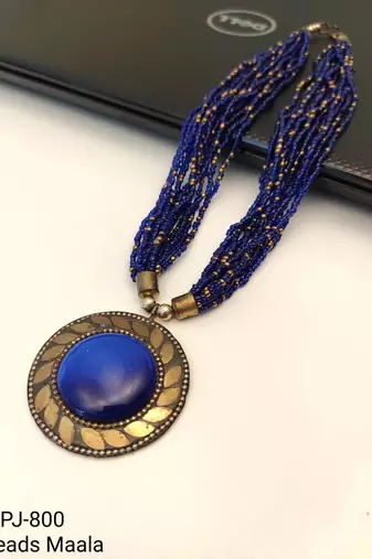 Blue & gold multi-strand beaded necklace with round medallion pendant, boho tribal style